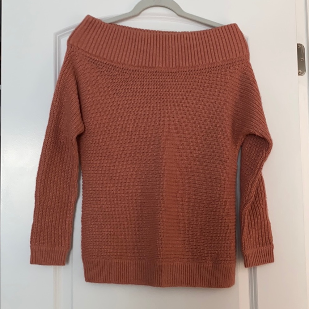 Off the shoulders sweater.